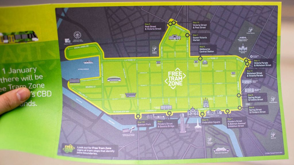 The printed handout indicates where the free tram zone is.